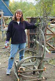 Weaving willow for a garden chair at the willow workshop